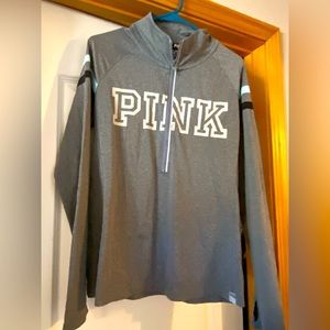 Pink 3/4 zip pull over.
